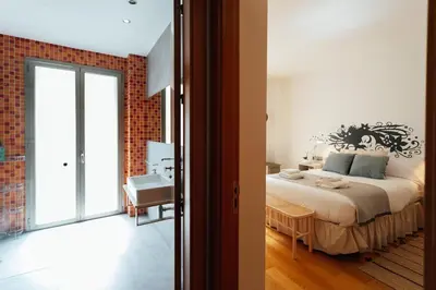 Cama o camas de una habitación en Alohamundi San Martín