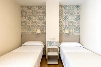 Cama o camas de una habitación en Colectia Hotel Santa Lucía