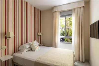 Cama o camas de una habitación en Colectia Hotel Santa Lucía