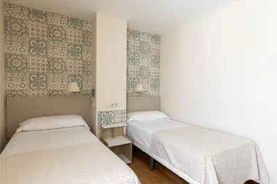 Cama o camas de una habitación en Colectia Hotel Santa Lucía