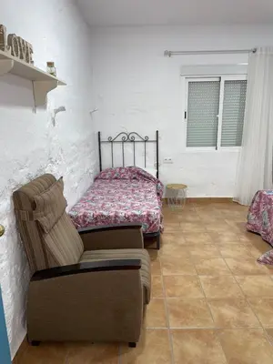 Cama o camas de una habitación en La casa del olivo