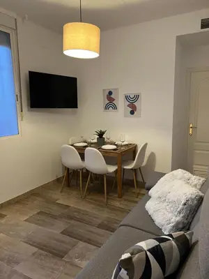 Una televisión o centro de entretenimiento en ATICO SUITE CLAUDIO MARCELO