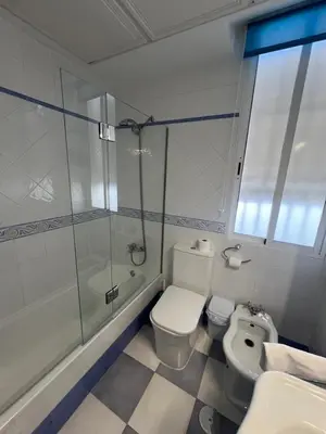 Un baño de ATICO SUITE CLAUDIO MARCELO