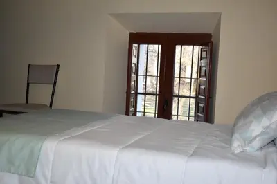 Cama o camas de una habitación en Hotel Rural El Refugio de Los Templarios