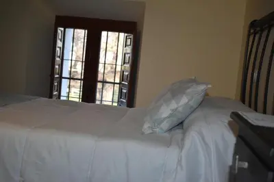 Cama o camas de una habitación en Hotel Rural El Refugio de Los Templarios