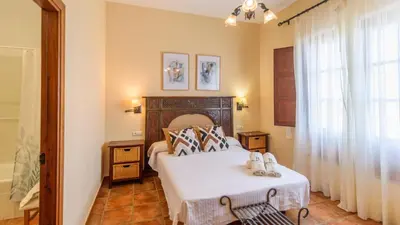 Cama o camas de una habitación en Casa Rural Aire Fuente de Piedra by Ruralidays