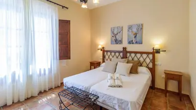 Cama o camas de una habitación en Casa Rural Aire Fuente de Piedra by Ruralidays