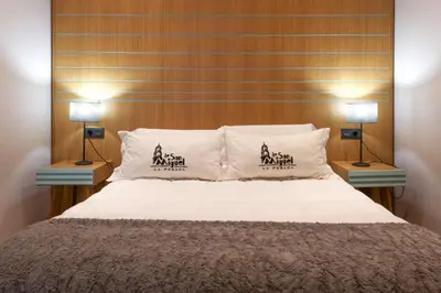 Cama o camas de una habitación en La Posada de San Miguel