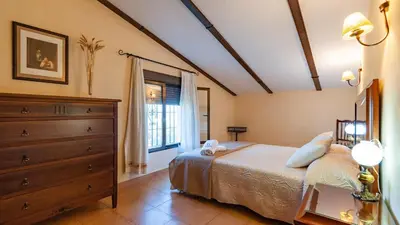 Cama o camas de una habitación en Alojamiento Rural la Aragonesa Marmolejo by Ruralidays