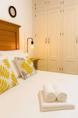 Cama o camas de una habitación en Acogedor y tranquilo cerca de las setas - centro