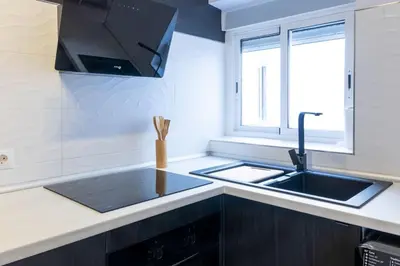 Una cocina o zona de cocina en Apartamento completo a 5 minutos estación tren.