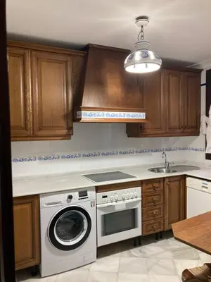 Una cocina o zona de cocina en Duplex Santamaria