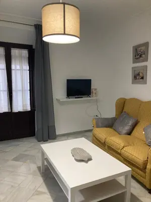 Una televisión o centro de entretenimiento en Duplex Santamaria