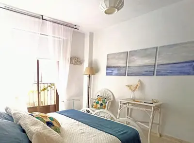 Cama o camas de una habitación en Apartamento baños Árabes