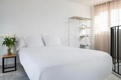 Cama o camas de una habitación en Magno Apartments San Gil - Shared Jacuzzi
