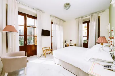 Cama o camas de una habitación en Basic Hotel Doña Manuela