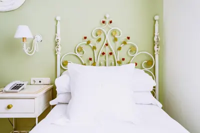 Cama o camas de una habitación en Basic Hotel Doña Manuela