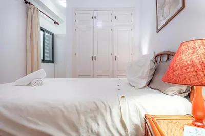 Cama o camas de una habitación en Alejo Fernandez Dreams de Santa Cruz Oasis Sevilla