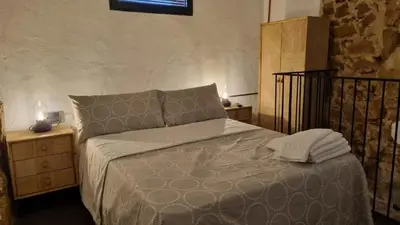 Cama o camas de una habitación en MIRADOR DE MARIA ROSA