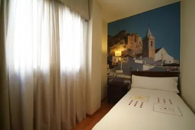 Cama o camas de una habitación en Apartamentos Ardales