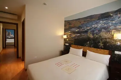 Cama o camas de una habitación en Apartamentos Ardales
