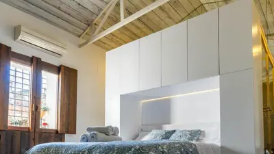 Cama o camas de una habitación en Sueños de la Judería Centro Cordoba
