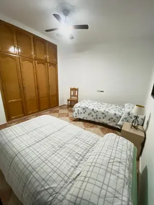 Cama o camas de una habitación en Casa Cruz de Marbella Luque