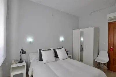 Cama o camas de una habitación en Hotel Gran Plaza