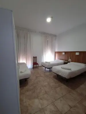 Cama o camas de una habitación en Hotel Gran Plaza