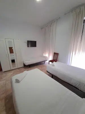 Cama o camas de una habitación en Hotel Gran Plaza