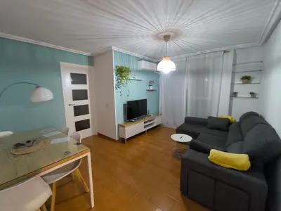 Una televisión o centro de entretenimiento en Alojamiento La Paz
