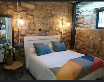 Cama o camas de una habitación en La Bodega
