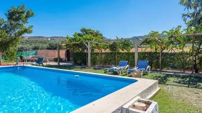 Piscina en o cerca de Casa Rural Huertas del Rio Archidona by Ruralidays