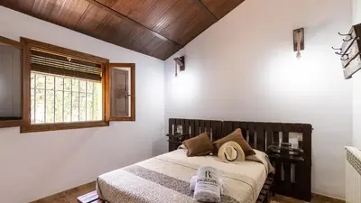 Cama o camas de una habitación en Cortijo El Prado Villanueva de Algaidas by Ruralidays