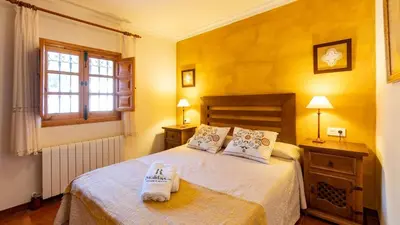 Cama o camas de una habitación en La Colina Villanueva del Rosario by Ruralidays