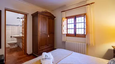 Cama o camas de una habitación en La Colina Villanueva del Rosario by Ruralidays