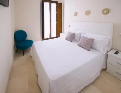 Cama o camas de una habitación en Hoteles del Sur