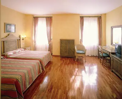 Cama o camas de una habitación en Balneario de Alhama de Granada