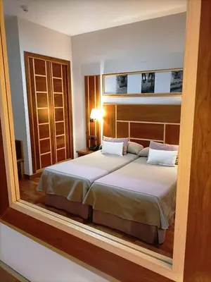 Cama o camas de una habitación en Hotel Carmen