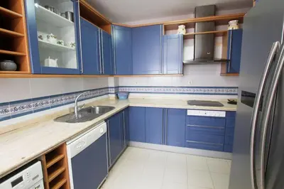 Una cocina o zona de cocina en Sevilla Clásica: amigos y familia. Parking gratis!