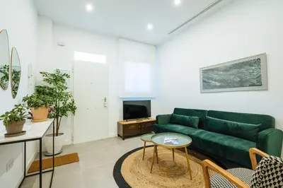 Una televisión o centro de entretenimiento en Urban Pulses Nervión
