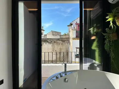 Un balcón o terraza de La Mini Casa