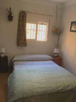 Cama o camas de una habitación en Barrio Macarena - Gardenia