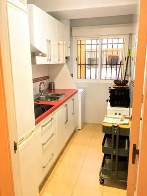 Una cocina o zona de cocina en Barrio Macarena - Gardenia