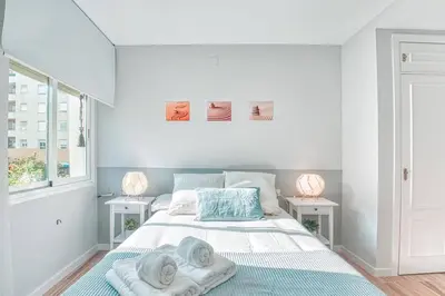 Cama o camas de una habitación en Apartamento New Folch Sevilla B