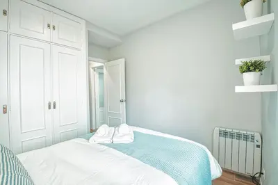 Cama o camas de una habitación en Apartamento New Folch Sevilla B