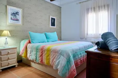 Cama o camas de una habitación en Vistaverde - Casa Adosada de 3 habitaciones con Piscina y Pista de Padel en la Vía Verde