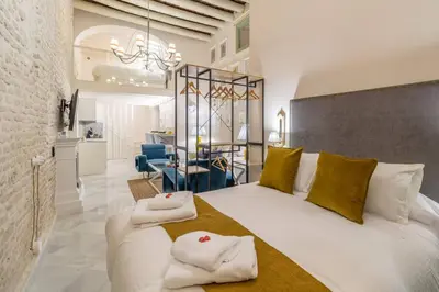 Cama o camas de una habitación en Judería de Sevilla II - Luxury Apartments