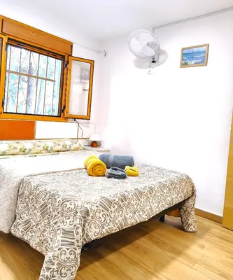 Cama o camas de una habitación en El Remanso