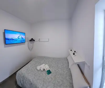 Cama o camas de una habitación en Mini Estudio JACUZZI DOBLE SEVILLA 